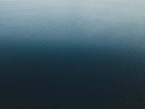 Aerial view of the blue shades of the sea in San Vito Lo Capo, Sicily, Italy.
