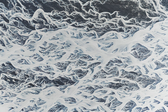 Aerial view of abstract ice rivers in Iceland.