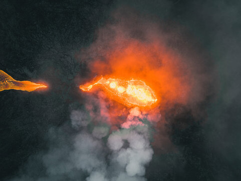 Aerial view of a lava explosion and the fog in Iceland.
