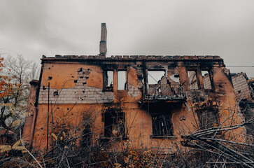destroyed and burned houses in the city during the war in Ukraine