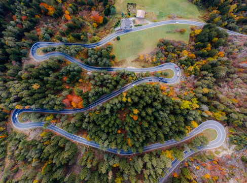 Aerial view of curvy road in San Valentino in Campo, Bolzano, Italy.