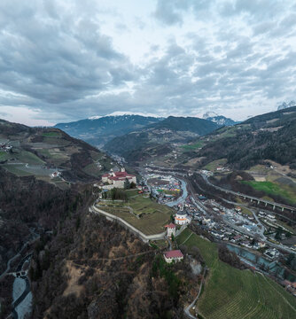 Aerial view of Klausen town with Sabiona Monastery, South Tyrol, Italy.