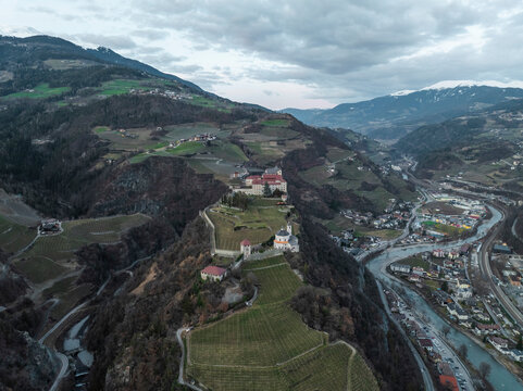 Aerial view of Chiusa town and Sabiona Monastery, Klausen, South Tyrol, Italy.