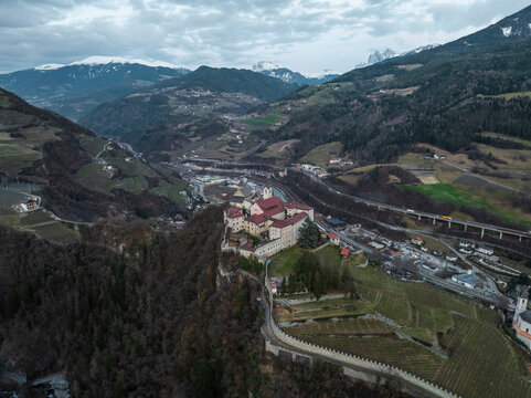 Aerial view of Sabiona Monastery and Chiusa town nestled in the beautiful landscape of the Dolomites, South Tyrol, Italy.