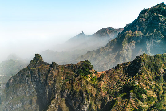 Aerial drone view of mountain peaks of Santo Antao island during Sahara sandstorm, Cape Verde.