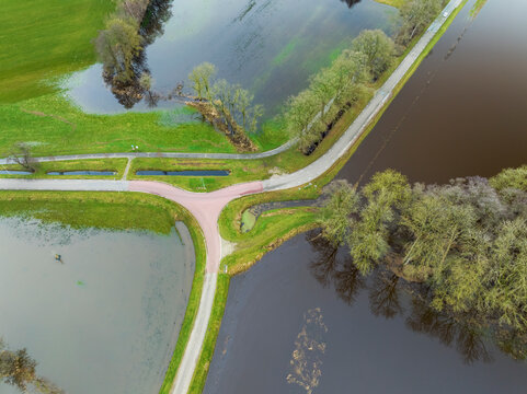 Abstract aerial top view of intersection during high water of river Vecht, Beerze, Vechtdal, Overijssel, Netherlands.