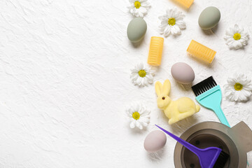 Hairdressing accessories with daisies, Easter eggs and bunny on white grunge background