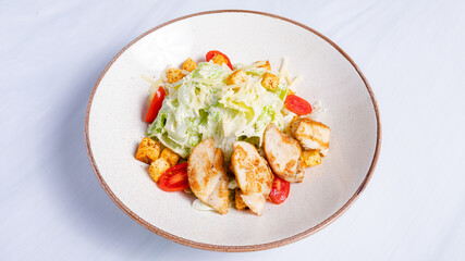 Chicken Caesar salad bowl top view