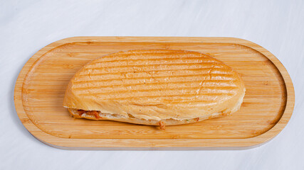 Doner kebab on wooden tray top view