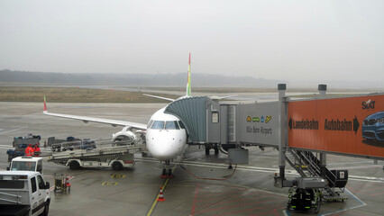 Cologne Bonn Airport, Germany. TAP Air Portugal plane disembark passengers in German airport