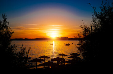 Beautiful sunset on Pefkos beach on the island of Rhodes in Greece. - 763285431