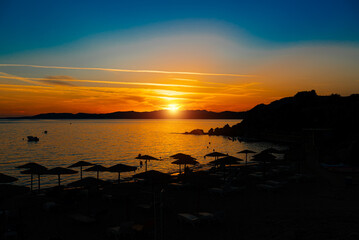 Beautiful sunset on Pefkos beach on the island of Rhodes in Greece. - 763285449