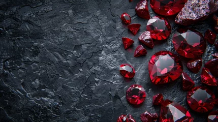 Fototapeten The dark red gemstone jewelry cut with dark stone background. Red Ruby gemstone Round Cut on stone background, close up shot Dazzling diamond red gemstones on black background © Sittipol 