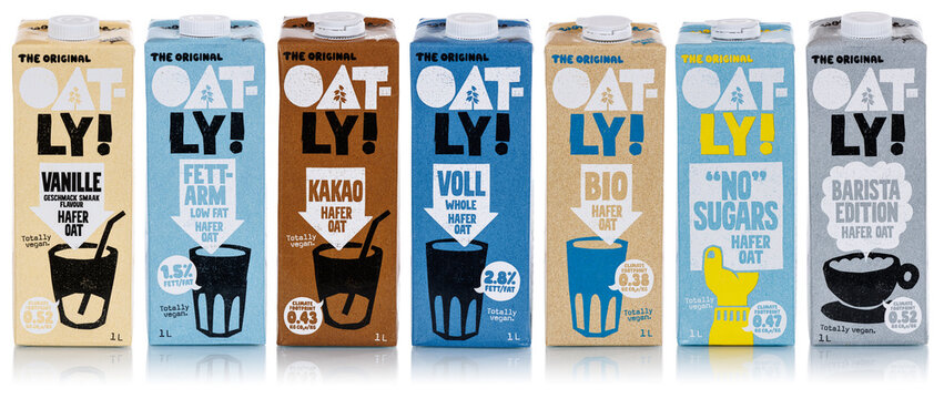 Oatly vegan oat milk different flavors isolated on a white background