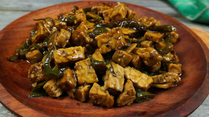 Orek tempe or Sauteed Tempe is a typical Indonesian cuisine with herbs, garlic, onion, chilli, long...