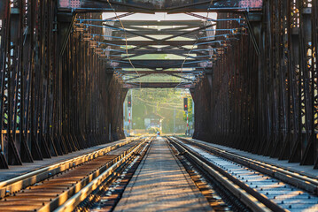 On the rails of the Vysehrad railway bridge over Vltava river. - obrazy, fototapety, plakaty