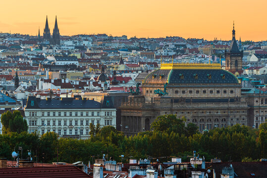 The cityscape of UNESCO site Prague with the National Theatre in the morning dawn. 