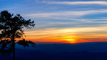 Fototapeta na wymiar Sunset at peak mountain landscape