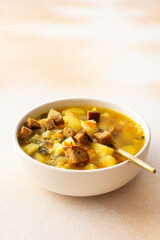 Pea soup with fried croutons, healthy bean soup