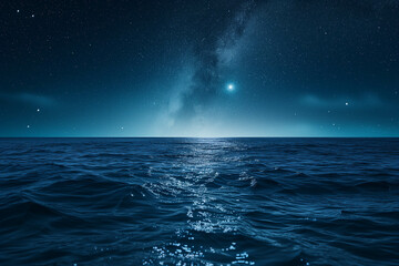 The ocean at night with the sky full of stars.