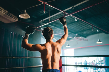 Gym atmosphere, Two professional fighters posing on the sport boxing ring. Fit muscular caucasian athletes or boxers fighting, Sport competition and human emotions concept, MMA or Thai Boxing match