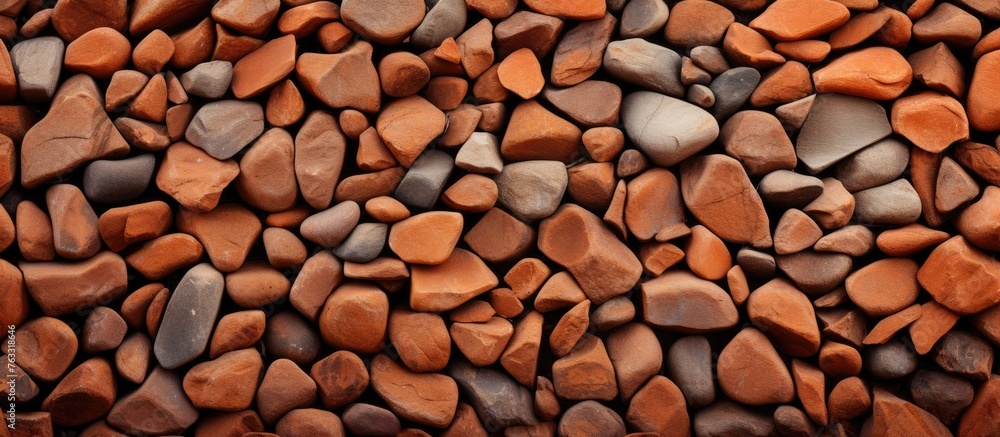 Poster an artistic creation using red rocks stacked to form a unique pattern, showcasing their potential as