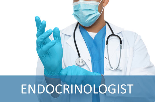 Endocrinologist in protective mask putting medical gloves on white background, closeup