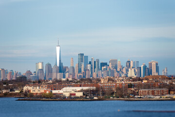 Fototapeta premium Evening panorama view on the New York city skyline from the container terminal in Newark.