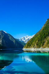 Jiuzhaigou Valley, Aba Qiang and Tibetan Autonomous Prefecture, Sichuan Province - beautiful lakes and mountains under the blue sky