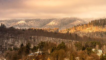 Winter views of the Poprad Landscape Park on the Poprad River in the Beskid Sadecki mountains.