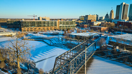 Aerial Winter Wells Street Bridge and St. Marys River in Snow-covered Fort Wayne