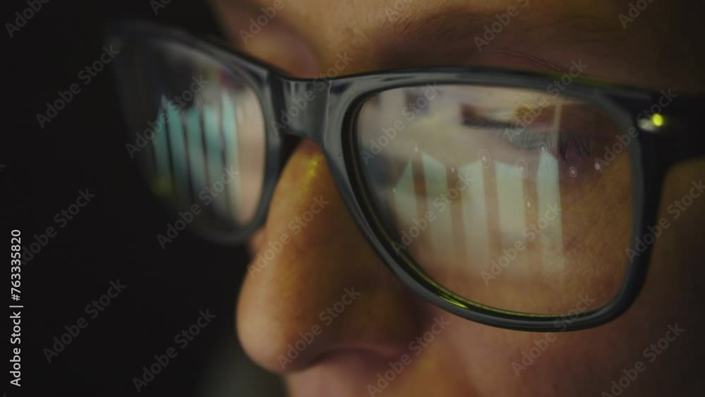 Poster in the reflection of glasses on a female face, there is an internet search engine and a growing grap