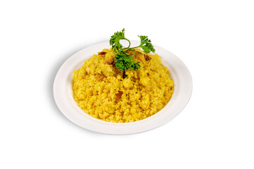 A plate of yellow Khichuri, an Indian dish made with rice and moong lentils