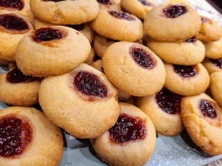 Golden-Brown Thumbprint Cookies with Jam Close-Up