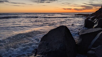 The Melted Rocks of Swamis Beach. Erosion control boulders put down along the shore 50 years ago...