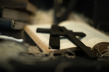 christian wooden crosses on the bible