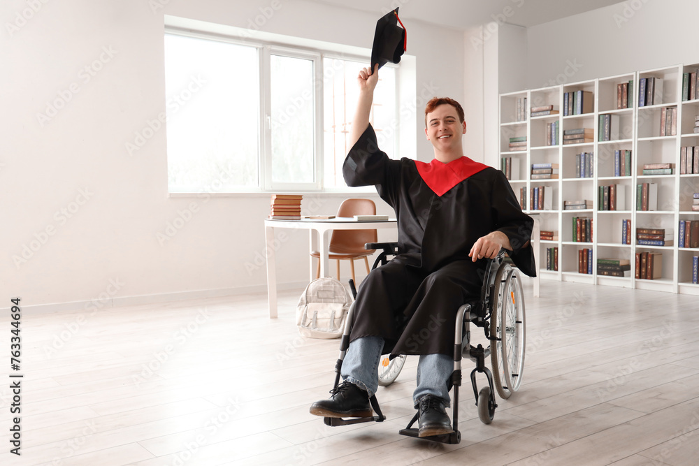 Sticker Happy male graduate in wheelchair at university