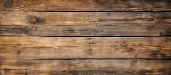 Fototapeta premium A weathered wooden wall with numerous planks