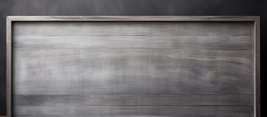 Wooden frame against black backdrop