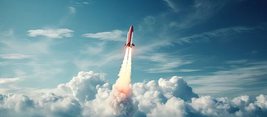 Fotobehang A rocket soaring through the sky © vxnaghiyev