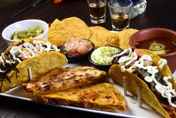 delicious Mexican cuisine guacamole, taco, tortilla, spicy Mexican chille