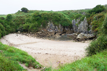 Gulpiyuri beach on a rainy day. Asturias, Spain