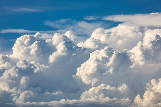 Large storm clouds forming on the horizon on a warm summer evening; Edmonton, Alberta, Canada