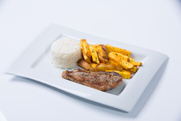 Peruvian food delicious rice with grilled steak