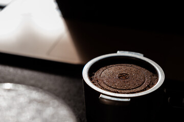 coffee on the desktop near the laptop . lunch at work