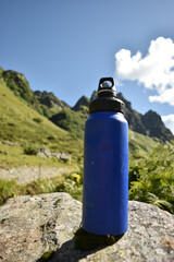 Sustainable Blue Water Bottle in Alpine Mountain Setting - 763379415