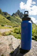 Sustainable Blue Water Bottle in Alpine Mountain Setting - 763379430