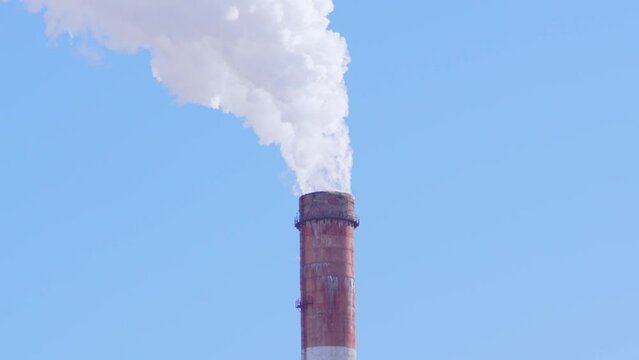 Ephemeral Emissions: The Artistry of a Factory Chimneys Smokestack
