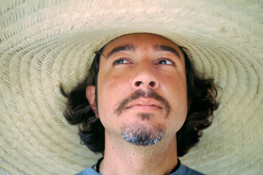 Brazilian man wearing a large brimmed hat; Pantanal Region, Brazil