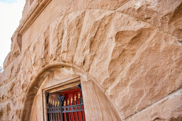 Sandstone Detail and Red Door at Historic Cemetery